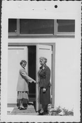 Mildred Edmundson and Kathleen Dunham entering the School depot, Santa Rosa, California, 1952