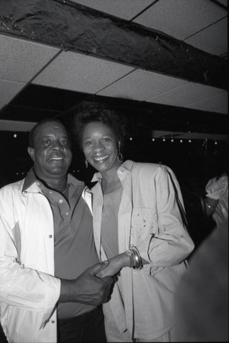 Unidentified couple posing together at the Pied Piper nightclub, Los Angeles, 1987