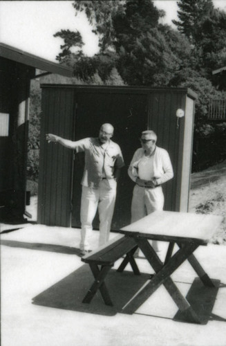 Long-time Marin City resident and community leader Jesse Berry at his new house, with a guest, circa 1963 [photograph]