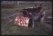 JUN84P4-28: "NO BLOOD FOR OIL" "POO" sign