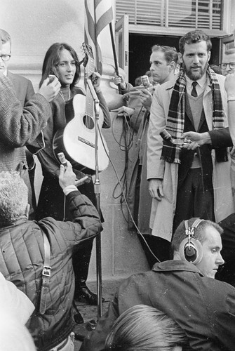 Joan Baez and Steve Weissman in front of Sproul Hall