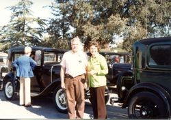 Vintage cars visit the Hallberg Apple Farm roadside stand, October, 1982