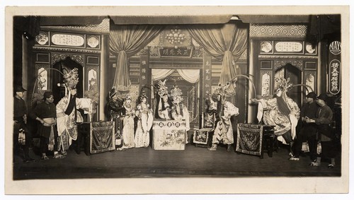 A King and his consort being denounced by generals while attendants look on at the Great China Theatre /