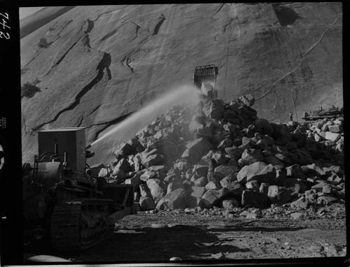 Big Creek - Mammoth Pool - Rock toe fill operation showing monitor unit mounted on TD-24 tractor