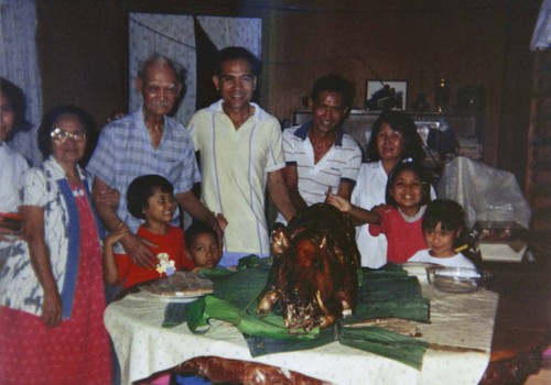 Filipino family celebration, [graphic]