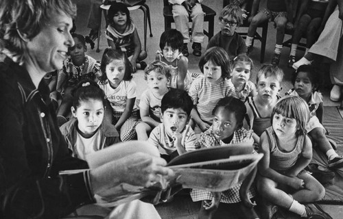 Storytime at the Lawson Branch Library, [graphic]