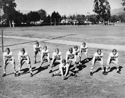 San Bernardino High School football team V formation, [graphic]