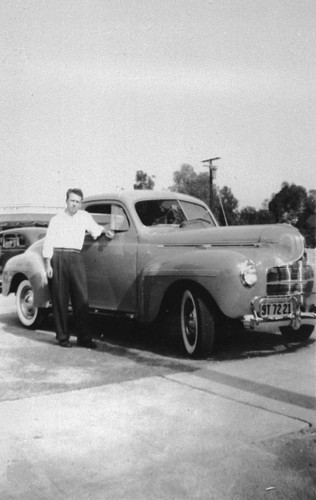 Ellwood Barrett and his new 1940 Dodge, [graphic]