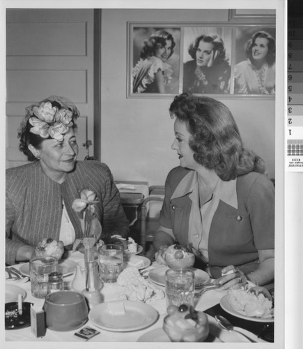 Mrs. Young at luncheon with Bette Davis