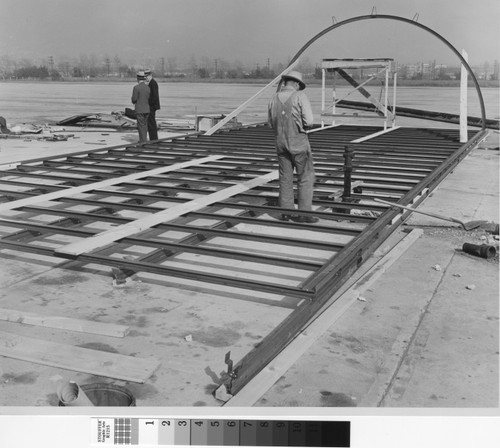 Photograph of the framing of a Quonset hut at Rodger Young Village