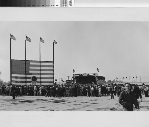 Photograph of crowd gathered in front of the stage at the Rodger Young Village dedication ceremony