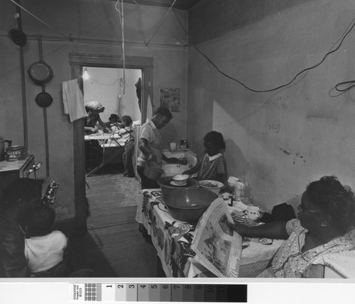 Photograph of the interior of a slum house