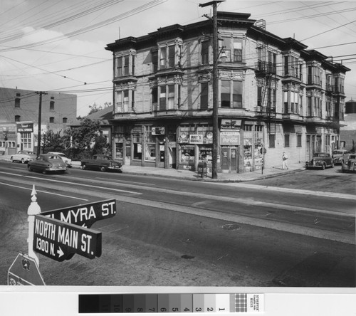 Photograph of building on corner of N. Main Street and Elmyra Street in Los Angeles, California