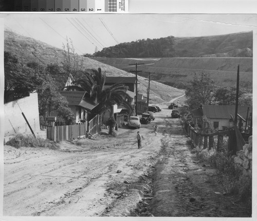 Photograph of two children walking up a hill in Chavez Ravine