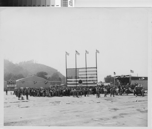 Photograph of crowd at the dedication of Rodger Young Village