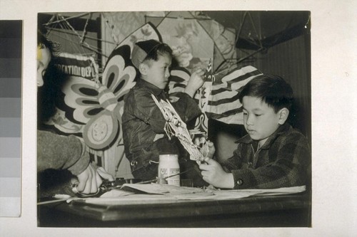 [Boys making kites.]