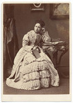 [Seated woman with stereo viewer]