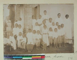 Ragnhild Andreassen together with healthy children from leprous parents, Ambohipiantrana, Antsirabe, Madagascar, 1901