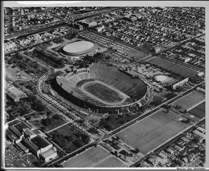 Aerial view facing east over the Coliseum and Sports Arena in Exposition Park in Central Los Angeles