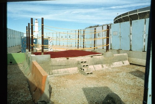 Untitled Depot: view of space between walls with bed spring "ring"