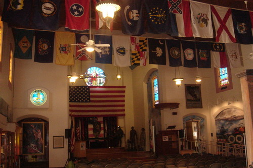 Heroes of War: Veterans Museum interior with flags