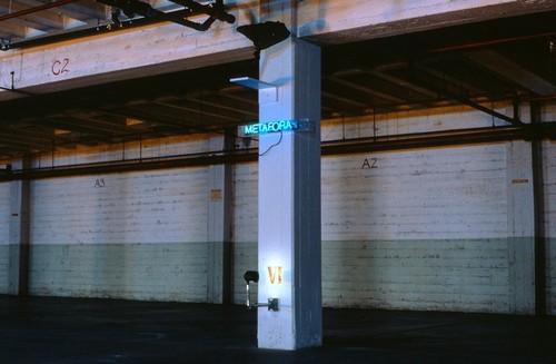 La Tierra Prometida: detail of column with neon sculpture