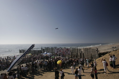 One Flew Over the Void (Bala perdida): human cannonball David Smith ascends from cannon and across border fence