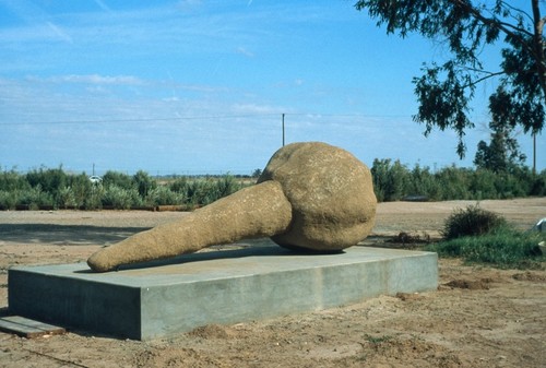 Signs of Mount Signal: View of large sand spike model on a concrete pedestal