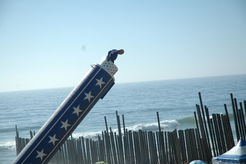 One Flew Over the Void (Bala perdida): human cannonball David Smith preparing to be shot from a cannon and across border fence