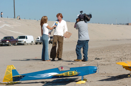 Aerial Bridge: artist Gomulicki interviewed by television news crew
