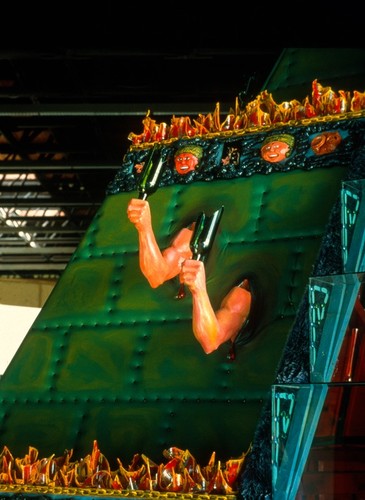 El Niño: detail of sculpture arms holding broken bottles