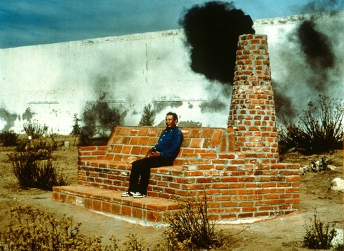 Abandoned II: Firesofa: man seated on "Firesofa"