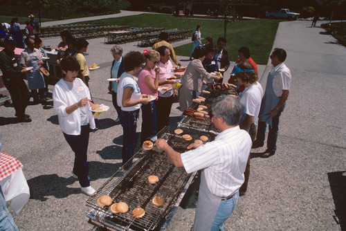 Hot dogs and hamburgers being served