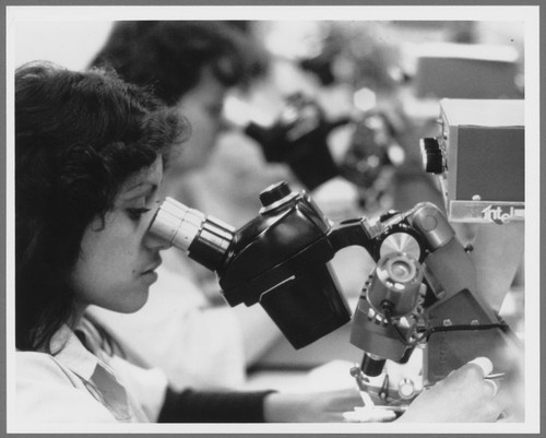 QA Inspector with Microscope, 1969