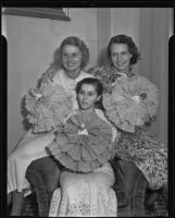 Frances Lord, Vera Johnson and Barbara Durley holding decorations for the International Women's Club breakfast, Los ANgeles