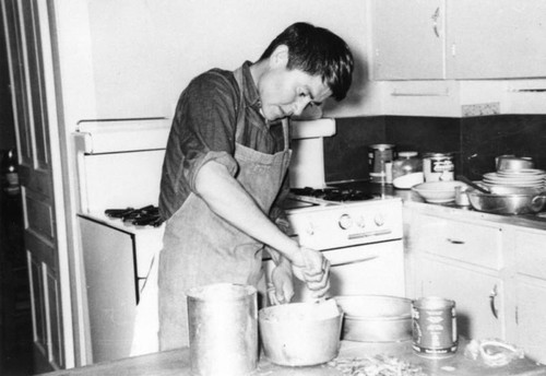 Sherman Indian High School student in kitchen