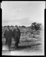 Gordon Stewart Northcott with man on his chicken ranch, Riverside, 1928-1930