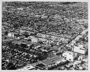 Aerial view facing northwest over Wilshire Boulevard and Fairfax Avenue. McCarthy Vista, Crescent Heights Boulevard, May Company