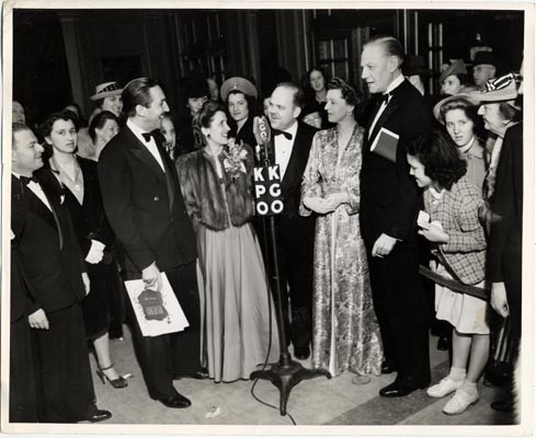 [Walt Disney, Mrs. Disney, Ted Malone, Mrs. Robert Miller & Mr. Miller at the opening of Fantasia at the Geary Theater]