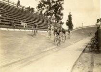 Cyclists on track at velodrome