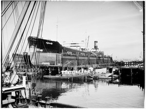Large ship under construction in a dry dock in Los Angeles Harbor