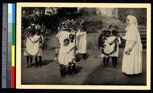 Malagasy girls framed in flowers, Madagascar, ca.1920-1940