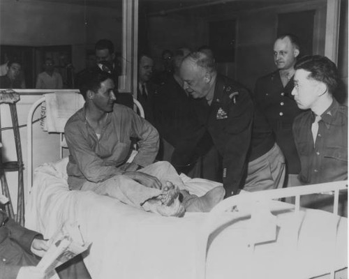 Tom Taketa, M.D., with General Eisenhower touring hospital