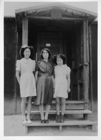 Reiko Nagumo with mother and sister at Heart Mountain Relocation Center