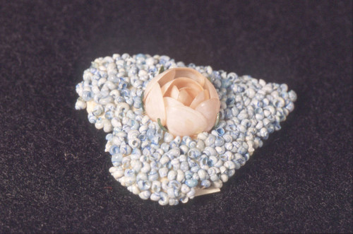 Heart shaped shell pin with pink flower