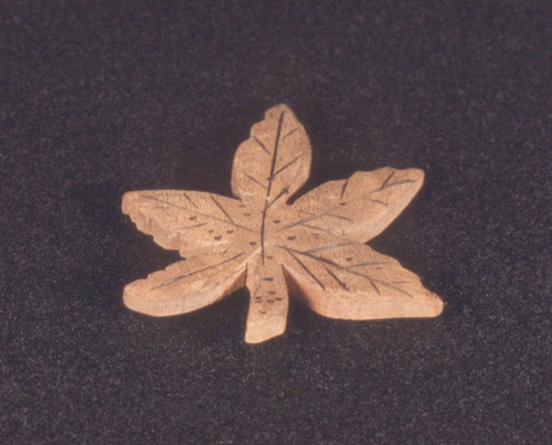 Maple leaf-shaped pin made from crate box wood
