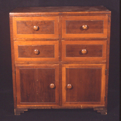 Chest with four drawers and two doors