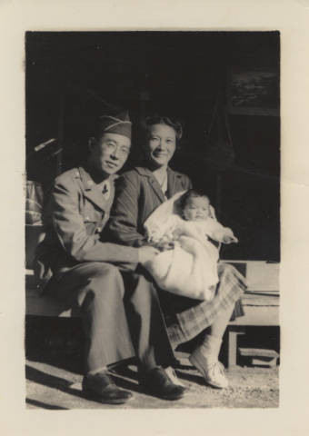 Kitaji family on the steps of barracks at Poston II Relocation Center