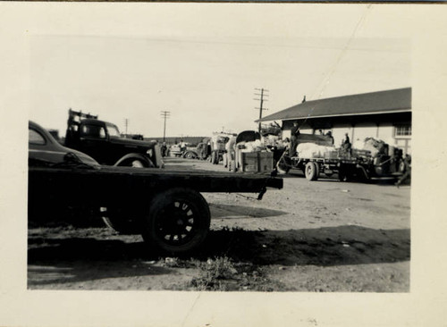 Unloading luggage from trucks at the Elk Grove train station