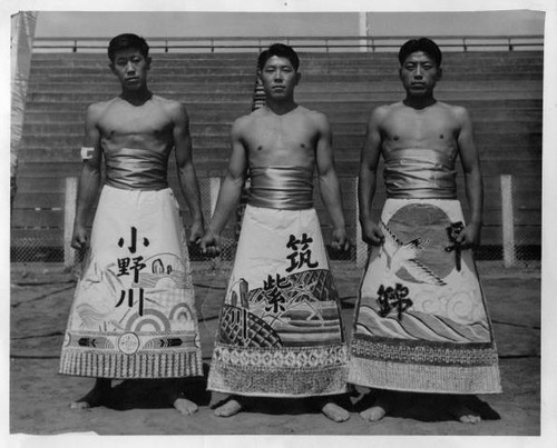 Three sumo wrestlers at Granada Relocation Center